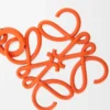 Anagram-berlock Orange