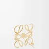 Anagram-brosch i metall Guld Anagram-brosch i metall Guld