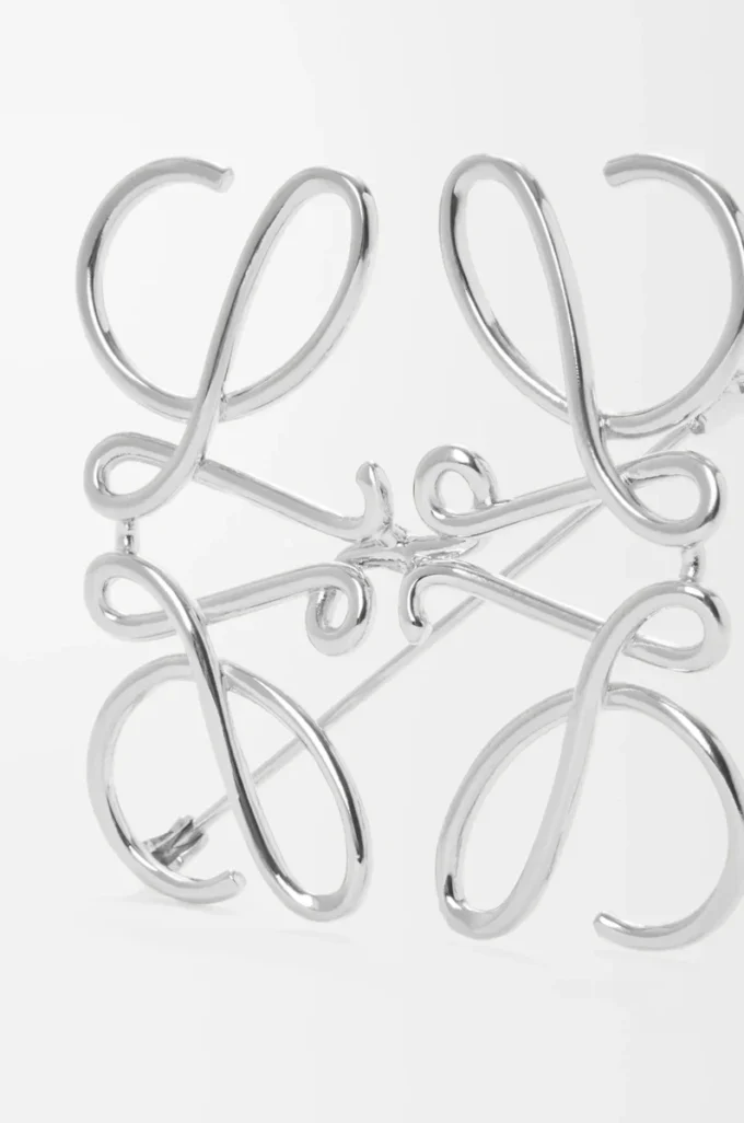 Anagram-brosch i metall Palladium Anagram-brosch i metall Palladium