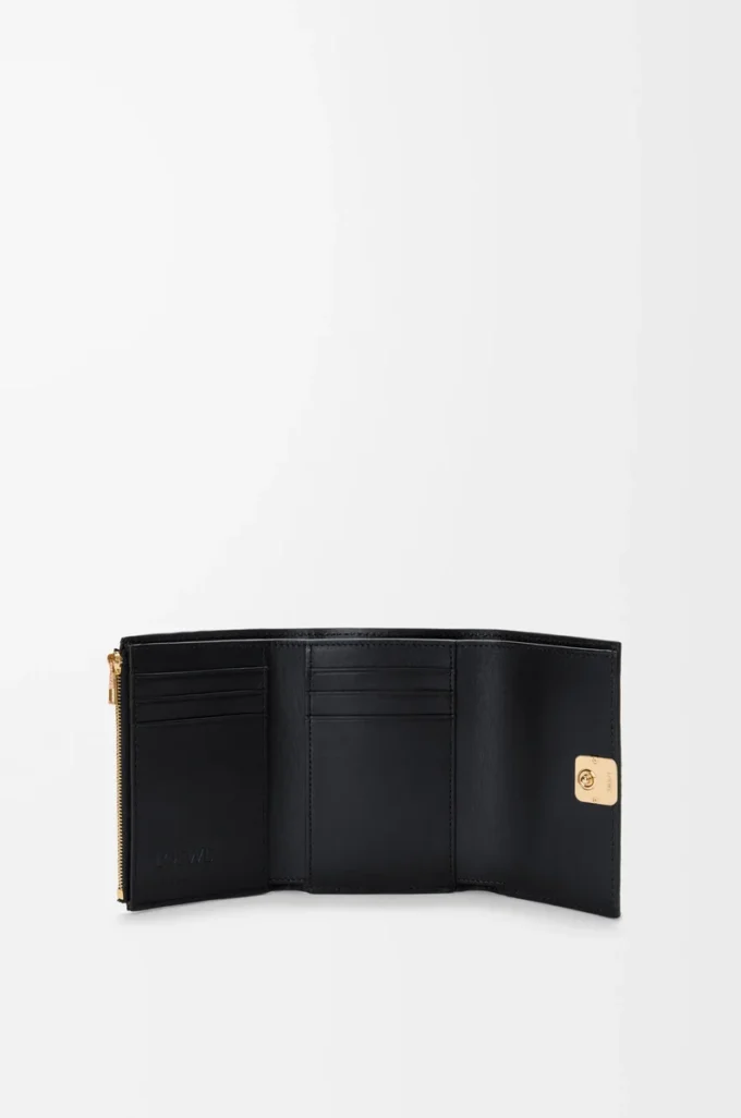 Anagram liten vertikal plånbok i kornigt kalvskinn Black/Gold