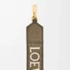 Anagram-rem i jacquard och kalvskinn Dark Khaki