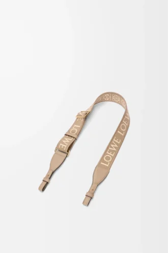 Anagram-rem i jacquard och kalvskinn Sand