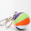 Basketbollcharm i kalvskinn och metall Flerfärgad