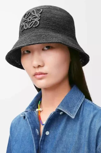 Bucket hat i raffia och kalvskinn Svart