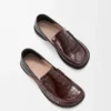Campo loafers med flik bak i präglat kalvskinn och nappalammskinn Mörkbrun/svart