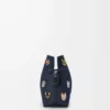 Cats medium Flamenco-clutch i broderad denim Blå Cats medium Flamenco-clutch i broderad denim Blå