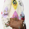 Cats mini Flamenco-clutch i nappa kalvskinn Mocha Cats mini Flamenco-clutch i nappa kalvskinn Mocha