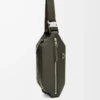 Convertible sling i klassiskt kalvskinn, mörk khaki Convertible sling i klassiskt kalvskinn, mörk khaki
