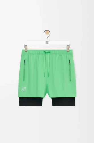 Funktionsshorts i tekniskt skal Grön