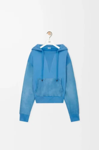 Hybridhoodie i bomull och nappalammskinn Blå