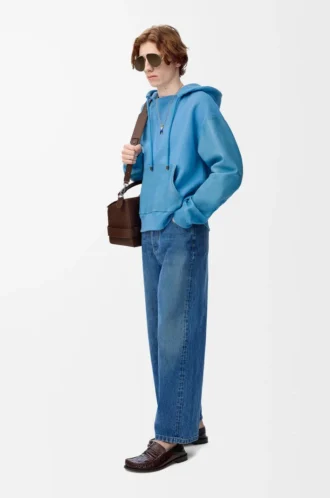 Hybridhoodie i bomull och nappalammskinn Blå