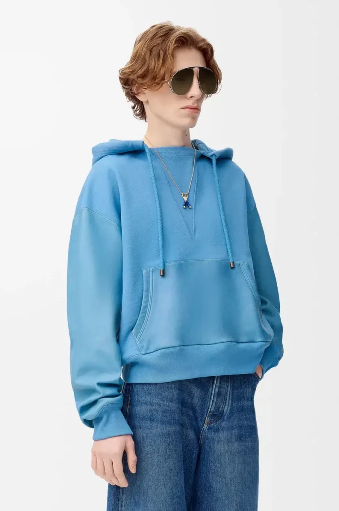 Hybridhoodie i bomull och nappalammskinn Blå Hybridhoodie i bomull och nappalammskinn Blå