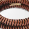 Interlock-armband i klassiskt kalvskinn Tan Interlock-armband i klassiskt kalvskinn Tan