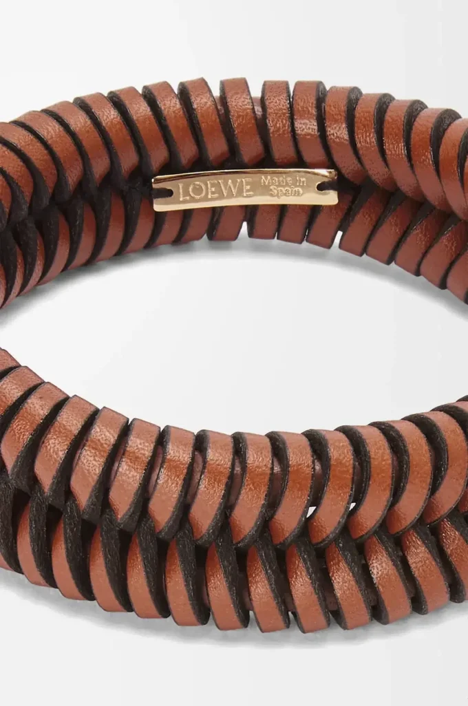 Interlock-armband i klassiskt kalvskinn Tan Interlock-armband i klassiskt kalvskinn Tan