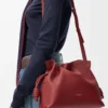 Medium Flamenco-clutch i nappa kalvskinn Burnt Red Medium Flamenco-clutch i nappa kalvskinn Burnt Red
