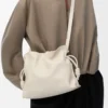 Medium Flamenco-clutch i nappa kalvskinn Sea Salt Medium Flamenco-clutch i nappa kalvskinn Sea Salt