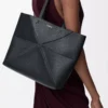 Medium horisontell Puzzle Fold-väska i mjukt kornat kalvskinn Svart Medium horisontell Puzzle Fold-väska i mjukt kornat kalvskinn Svart