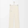 Mjuka bootleg-byxor i teknisk jersey, ivory Mjuka bootleg-byxor i teknisk jersey, ivory