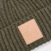 Mössa i kashmir, mörk khaki