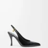 Nya Comic-pumps med slingback i blandat läder Svart
