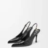 Nya Comic-pumps med slingback i blandat läder Svart