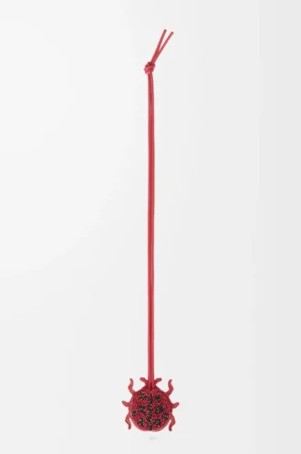 Nyckelring med nyckelring i pärlbroderat läder Ruby Red
