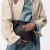 Panta medium Flamenco-clutch i glänsande kalvskinn Svart Panta medium Flamenco-clutch i glänsande kalvskinn Svart