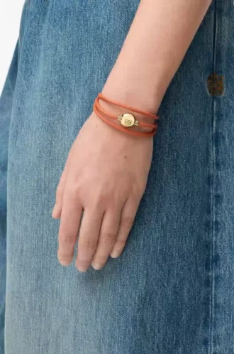 Pebble-armband i kalvskinn, orange/guld