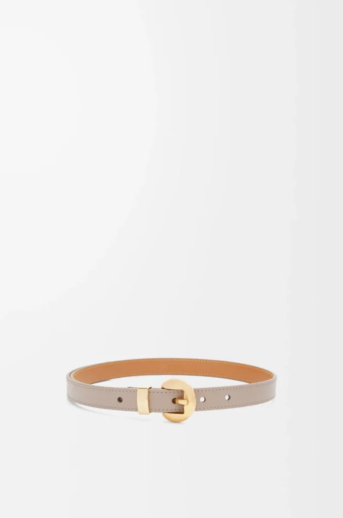 Pebble-bälte i slätt kalvskinn Sand/Guld Pebble-bälte i slätt kalvskinn Sand/Guld