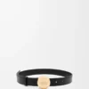 Pebble-bälte i slätt kalvskinn Svart/Guld Pebble-bälte i slätt kalvskinn Svart/Guld
