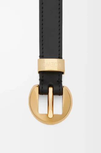Pebble-bälte i slätt kalvskinn Svart/Guld