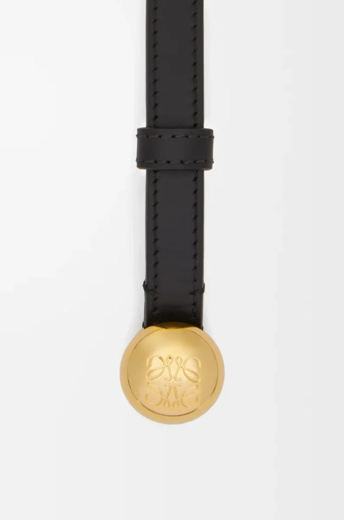 Pebble-bälte i slätt kalvskinn Svart/Guld