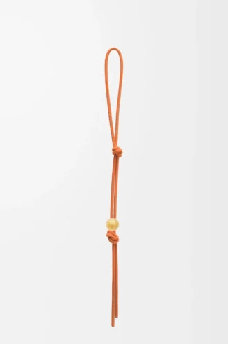 Personlig rem i klassiskt kalvskinn Maple Orange