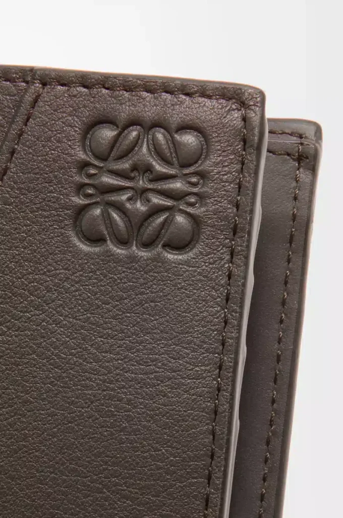 Puzzle bifold myntplånbok i klassiskt kalvskinn, mörkgrå