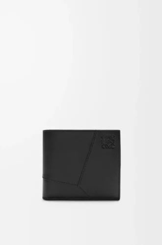 Puzzle bifold-myntplånbok i klassiskt kalvskinn Svart