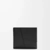 Puzzle bifold-myntplånbok i klassiskt kalvskinn Svart