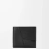 Puzzle bifold myntplånbok i mjukt kornat kalvskinn Svart