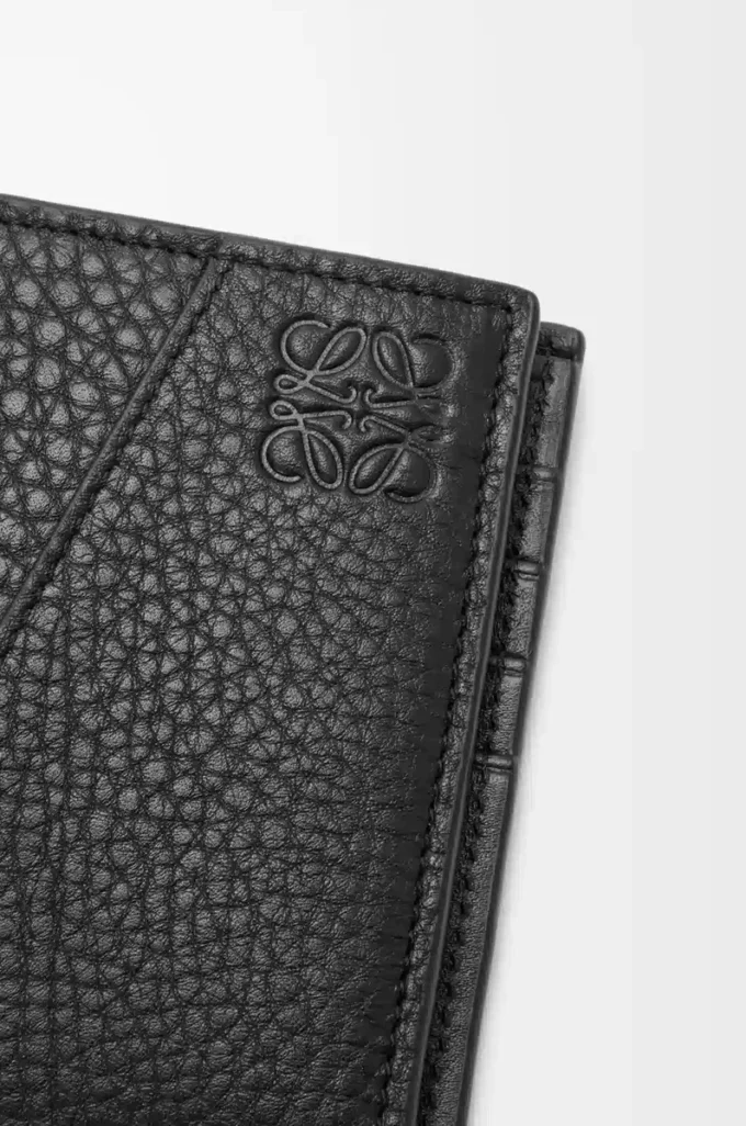 Puzzle bifold myntplånbok i mjukt kornat kalvskinn Svart