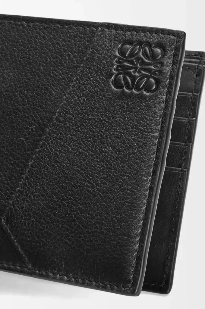 Puzzle bifold plånbok i klassiskt kalvskinn Svart
