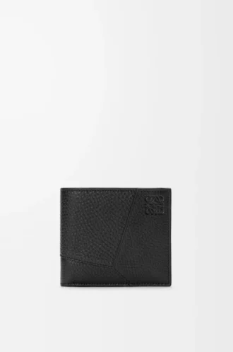 Puzzle bifold plånbok i mjukt kornat kalvskinn Svart