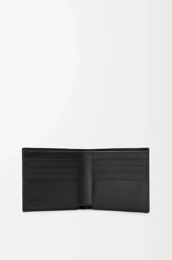 Puzzle bifold plånbok i mjukt kornat kalvskinn Svart
