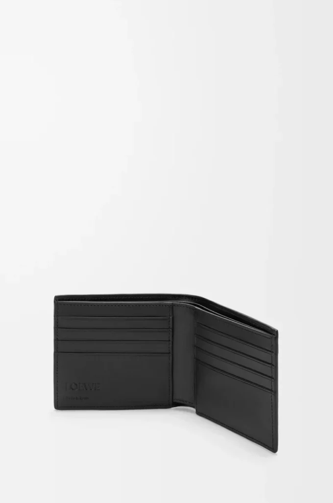 Puzzle bifold plånbok i mjukt kornat kalvskinn Svart