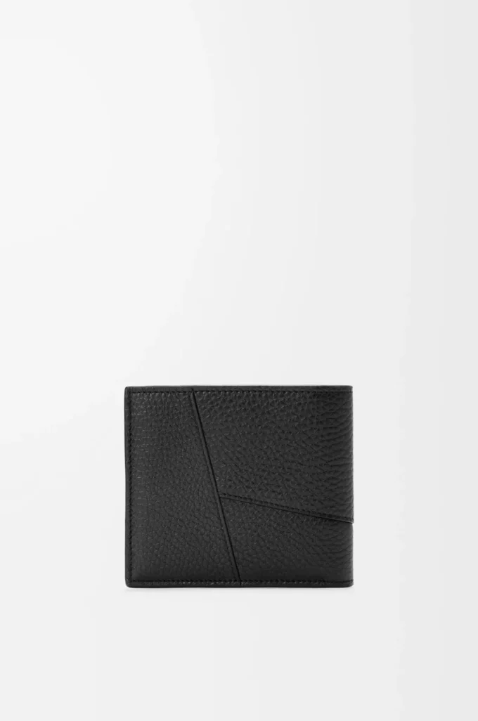 Puzzle bifold plånbok i mjukt kornat kalvskinn Svart