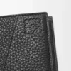 Puzzle bifold plånbok i mjukt kornat kalvskinn Svart