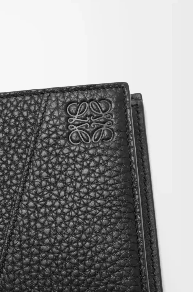 Puzzle bifold plånbok i mjukt kornat kalvskinn Svart