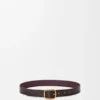 Rundat mjukt bälte i smidigt kornat kalvskinn Oxblood/Vintage Gold