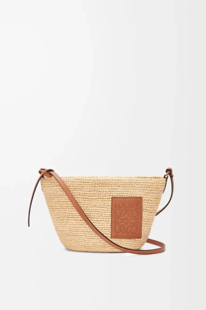 Slit pochette-väska i raffia och kalvskinn Natur/Tan Slit pochette-väska i raffia och kalvskinn Natur/Tan