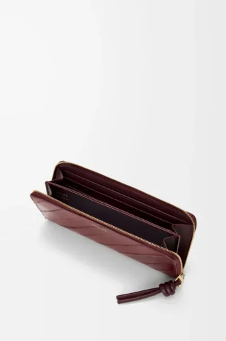 Smal plånbok med dragkedja och knut i ål Dark Burgundy