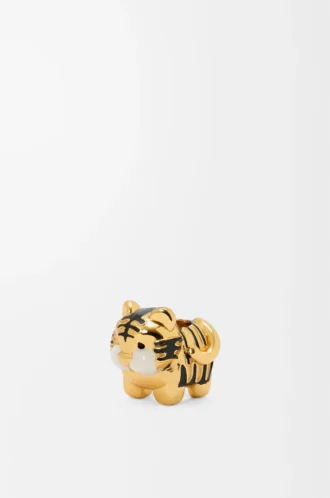 Tiger-tärning i guld